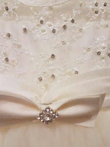 Ivory bow occasion dress